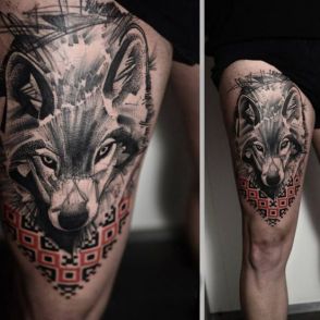 wilki tatuaże na naogę